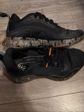 Rebook Black Athletic Sneakers with Cheetah Patterned Sole